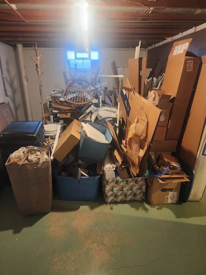 Roll-off dumpster container at job site for 20 Yard Dumpster Rental in Traverse City